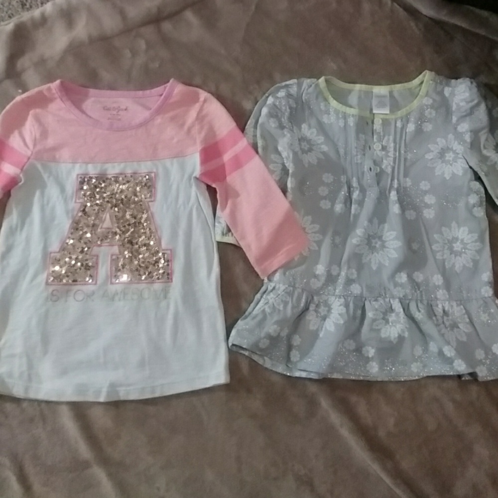 2 adorable girls shirts.